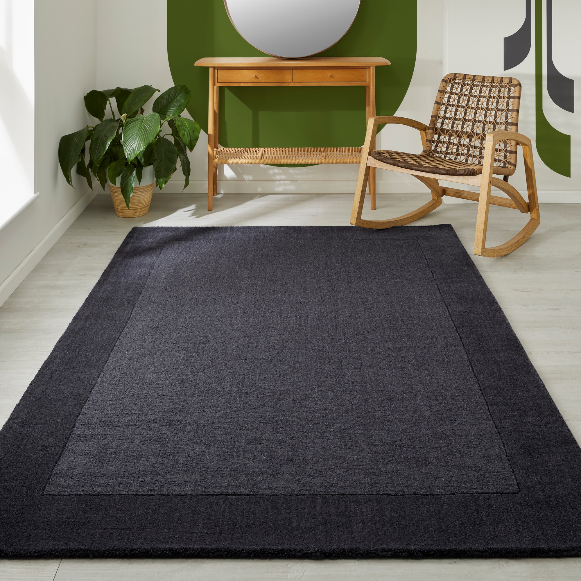 Colours Bordered Wool Rug In Charcoal Grey